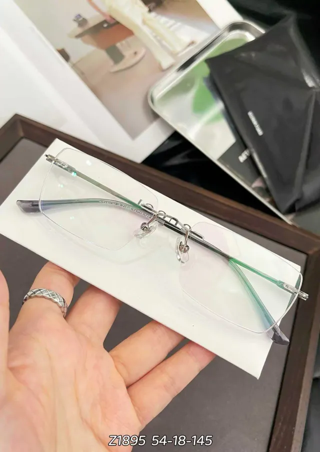 Ouyuan Z1895 montatura occhiali titanio rimless rettangolare