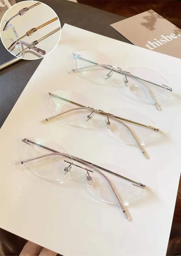 Ouyuan OYZ1893 occhiali da vista rimless titanio oro rosa